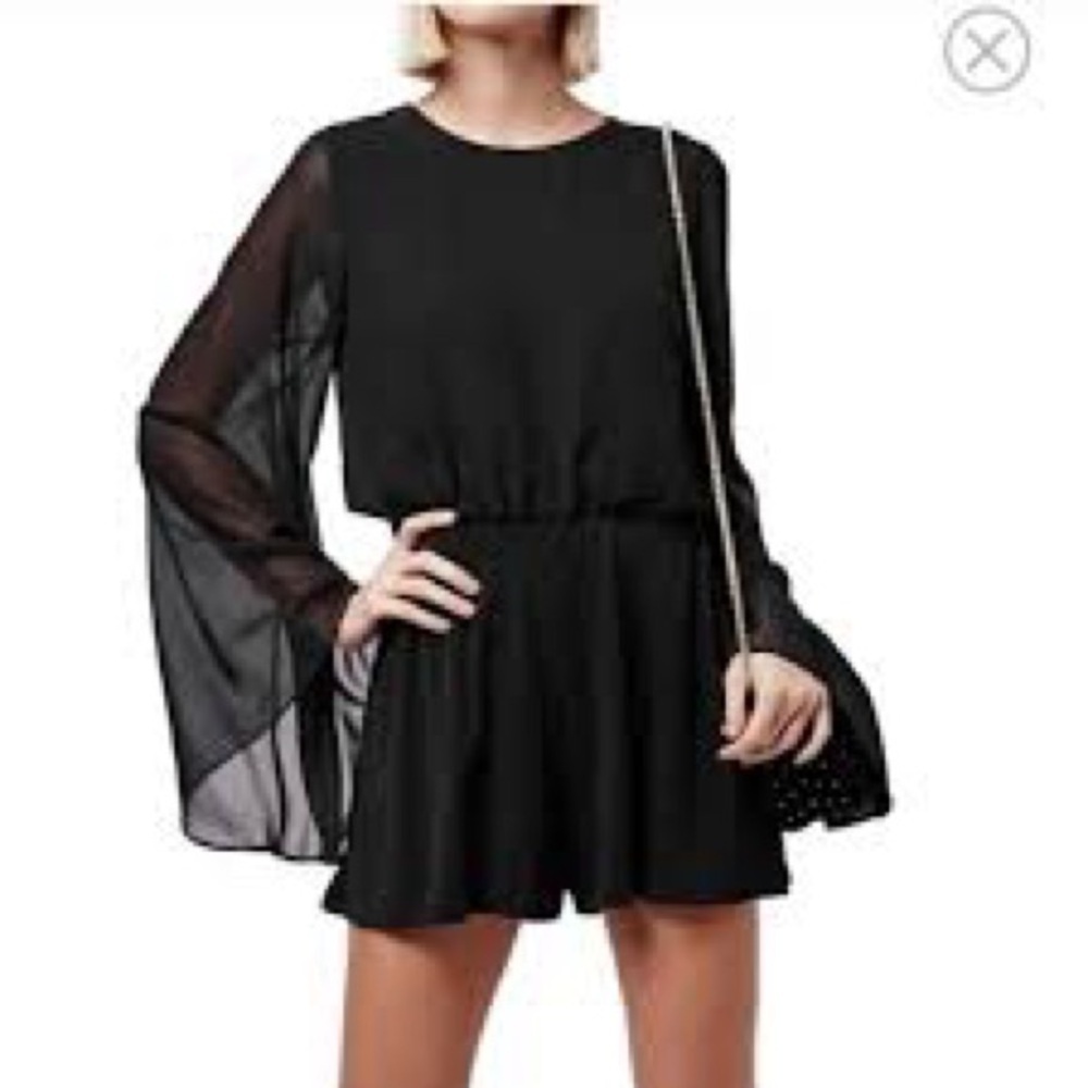 Top shop Elegant Black Sheer Romper. Size 6.
